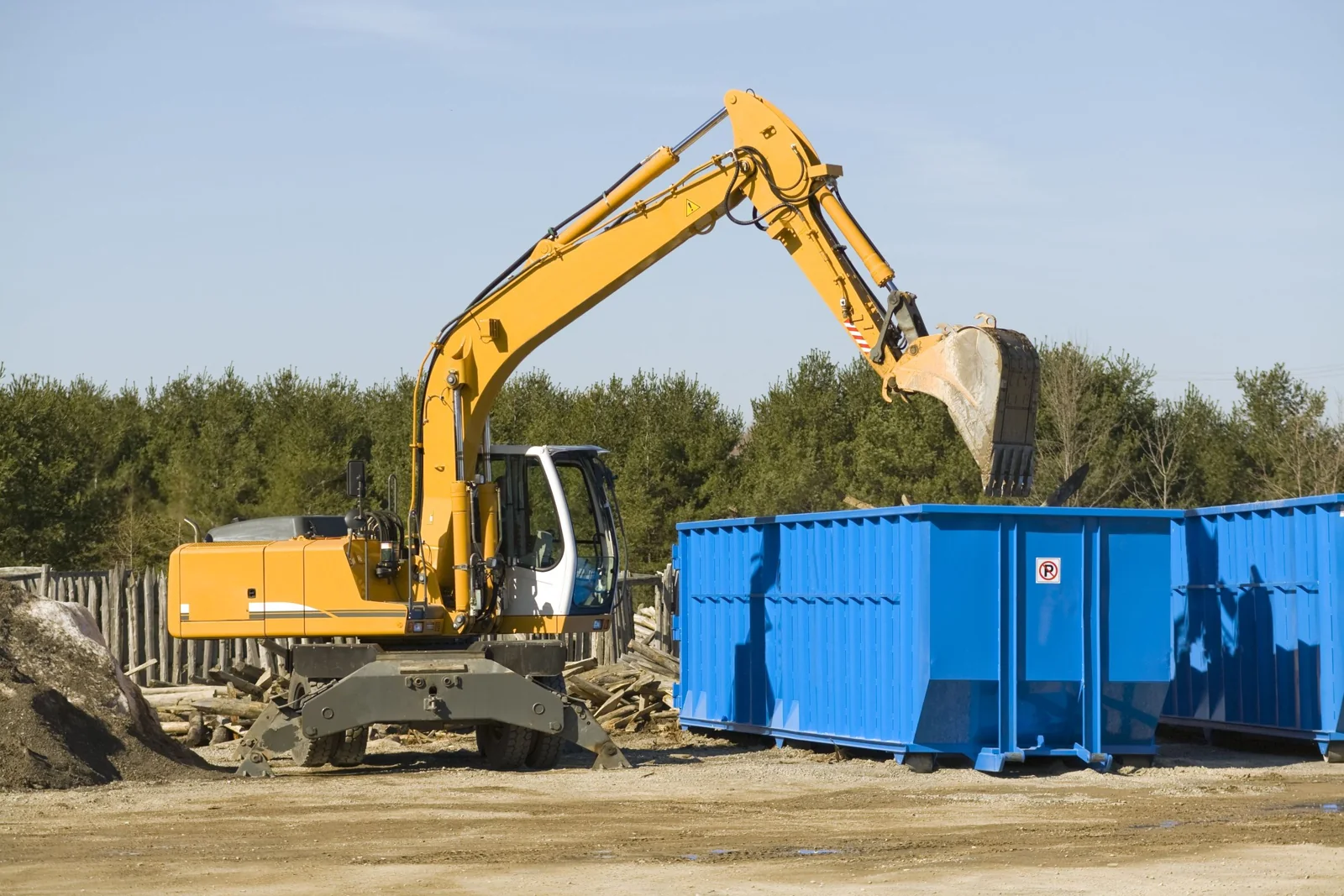 Roll-off container at an industrial work site